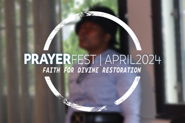 Woman praying in the background with Prayerfest April 2024 text